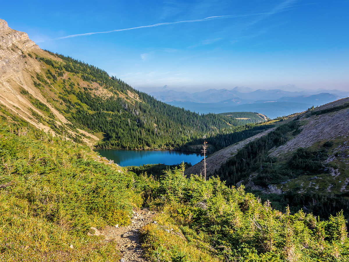 View of lower Southfork Lake on Southfork Mountain and Barnaby Ridge scramble in Castle Provincial Park, Alberta