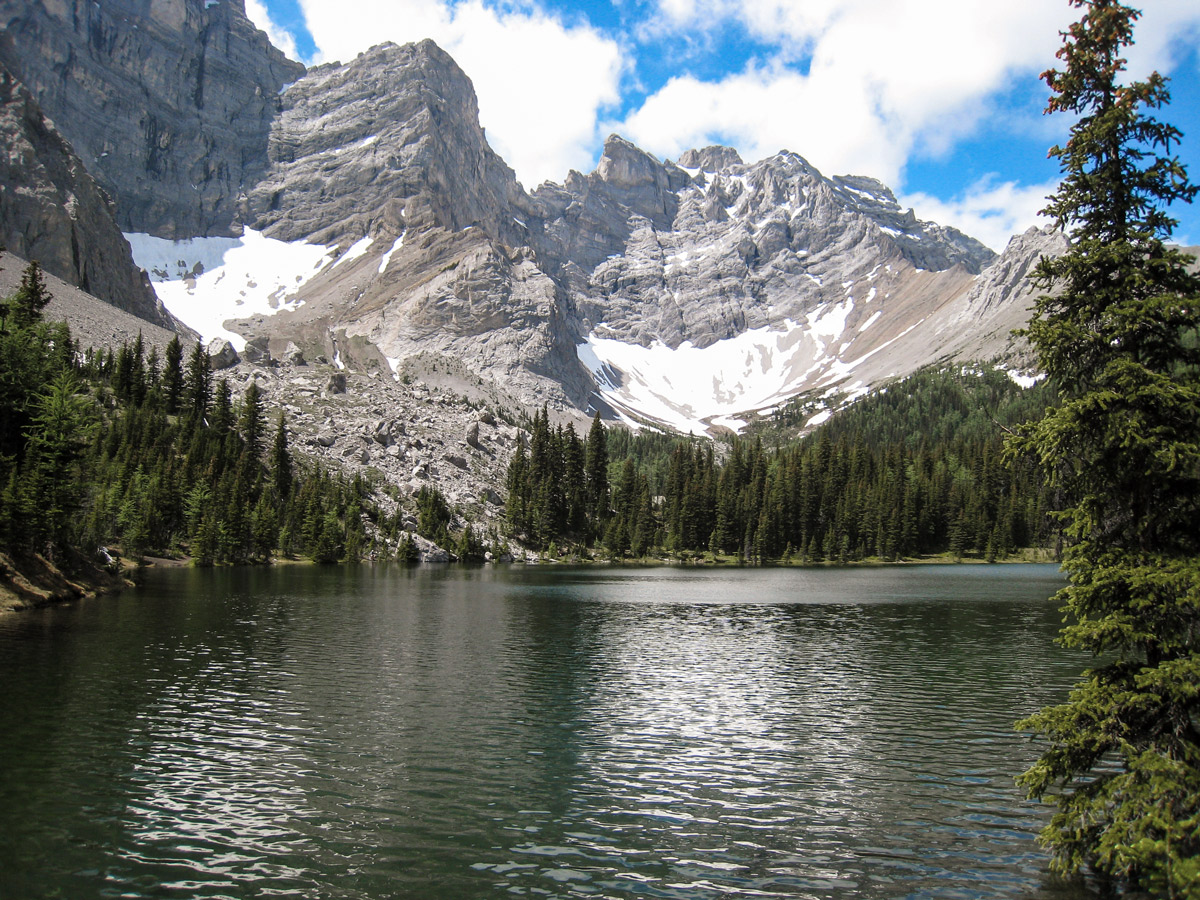 Beautiful view of the lake on Tombstone Lakes backpacking trail near Kananaskis, the Canadian Rockies