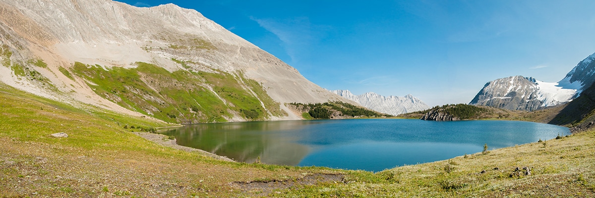 View across Maude Lake on Turbine Canyon backpacking trail near Kananaskis, the Canadian Rockies