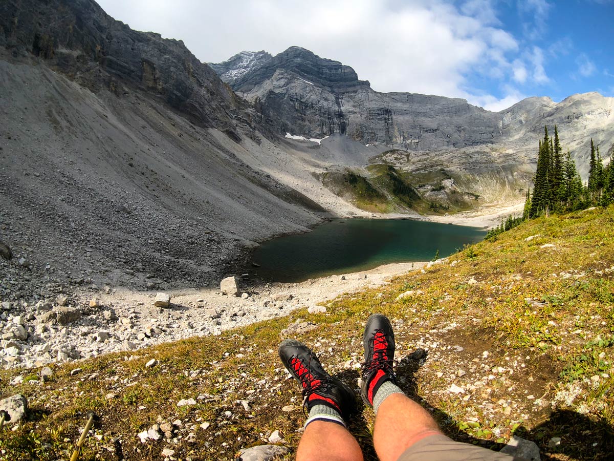 Taking a break on Lillian and Galatea Lakes backpacking trail in Kananaskis, Canmore
