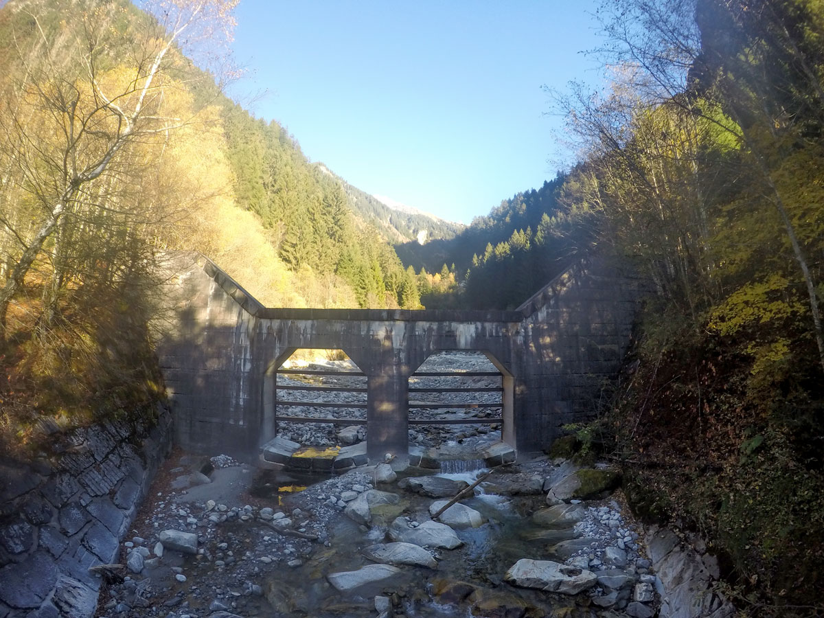 Crossing the bridge on Tristner hike in Mayrhofen, Zillertal Valley, Austria