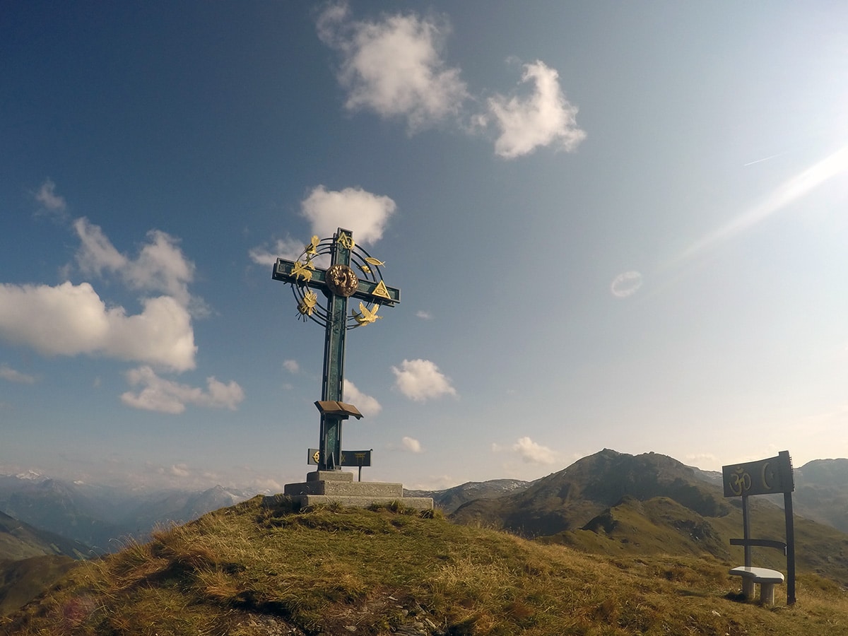 Summit cross on Kleiner Gilfert hike in Mayrhofen, Zillertal Valley, Austria