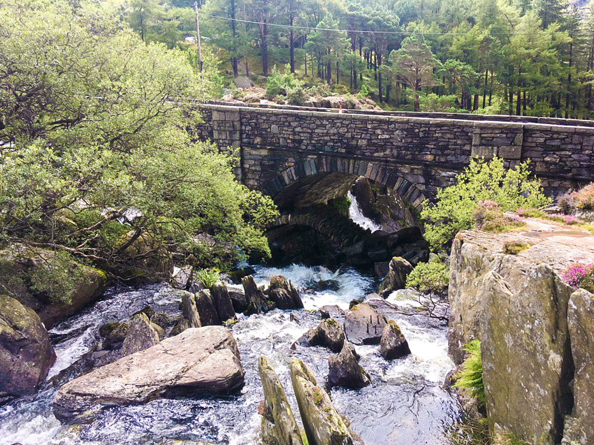 Bridge over Afon Ogwen on Llyn Ogwen walk in Snowdonia, Wales