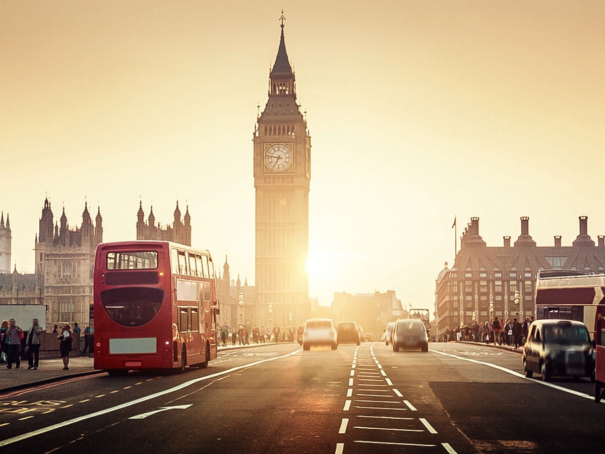 Westminster Bridge and Big Ben at sunset on a trail along the Thames from Battersea Park to the Tower walking tour in London, England