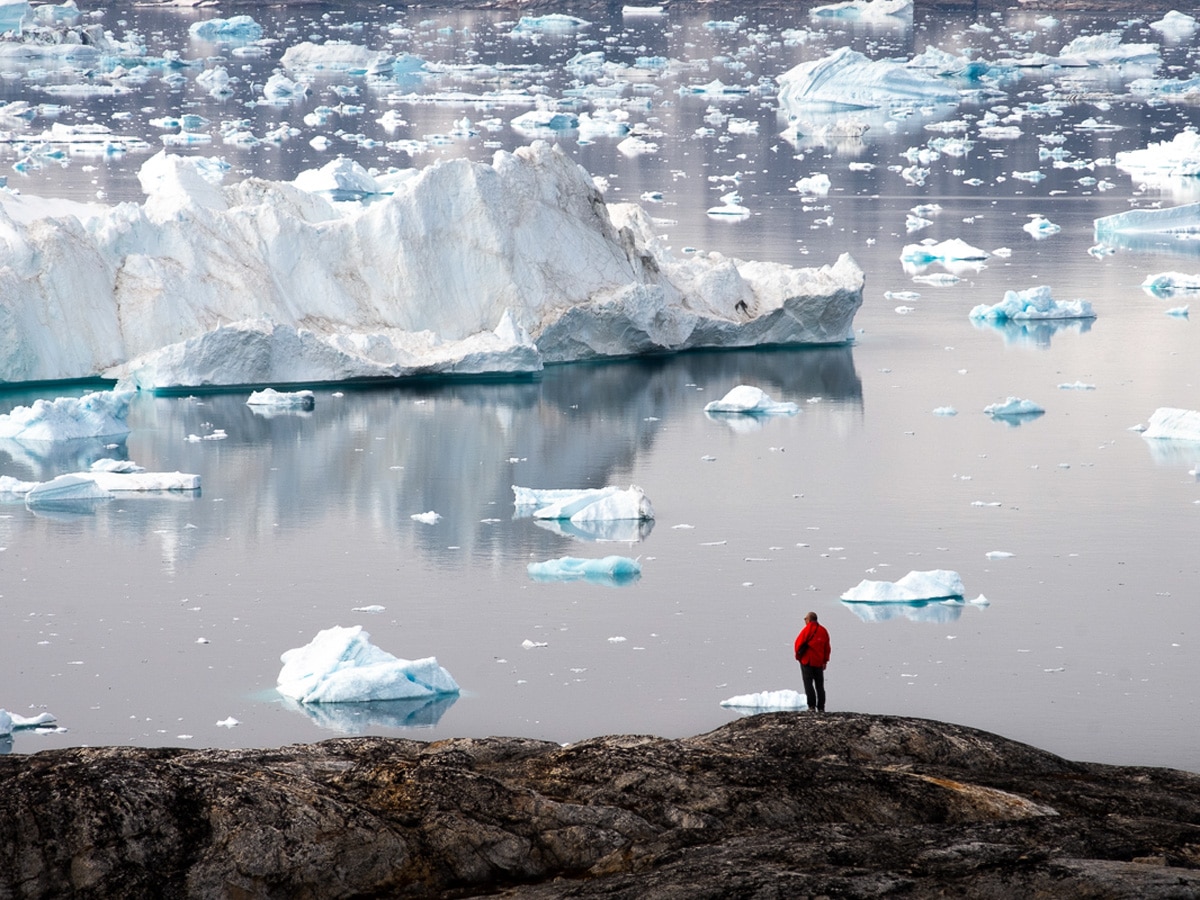 Lisa Germany watching icebergs in Tiniteqilaaq, East Greenland