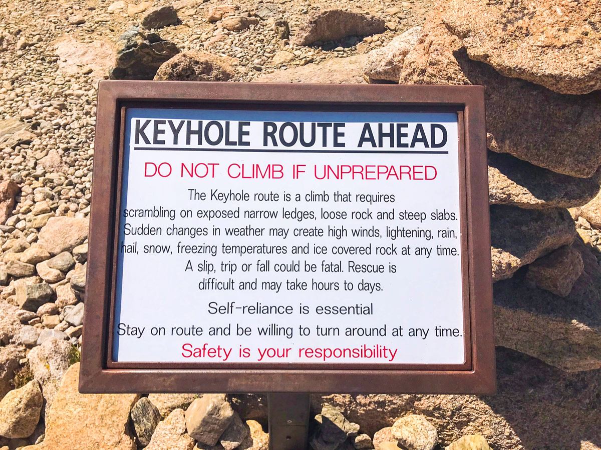 Warning sign on Keyhole route on Longs Peak scramble in Rocky Mountain National Park, Colorado