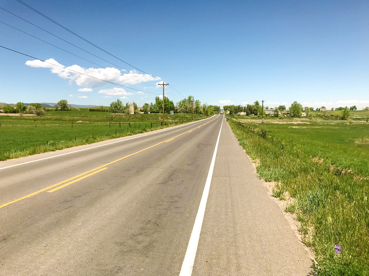 Green fields along N 63rd St loop road biking route in Boulder, Colorado