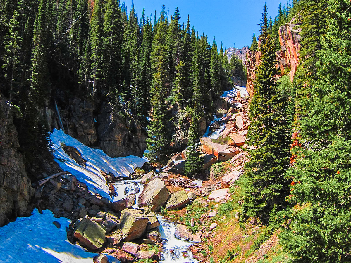 Snow on a trail of Loch hike in Rocky Mountain National Park, Colorado