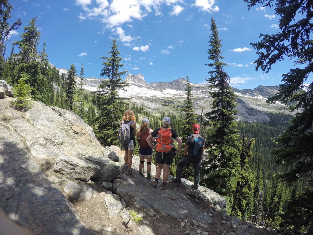 Hikers enjoying the view on Gimli Ridge hike in West Kootenays, the Canadian Rockies