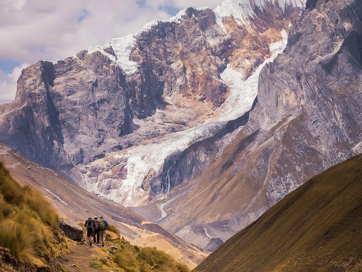 Hiking down from Punta Carhuac on Huayhuash Circuit Trek in Peru