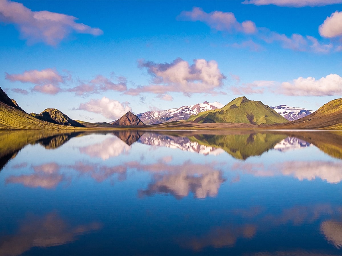 Reflections in the lake at Alftavatn on Iceland’s Volcanic Trails Trek