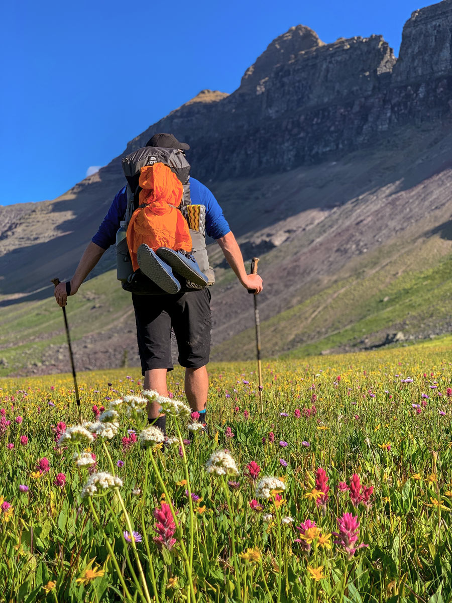 Hiker testing Granite Gear Crown 60 Backpack in Montana