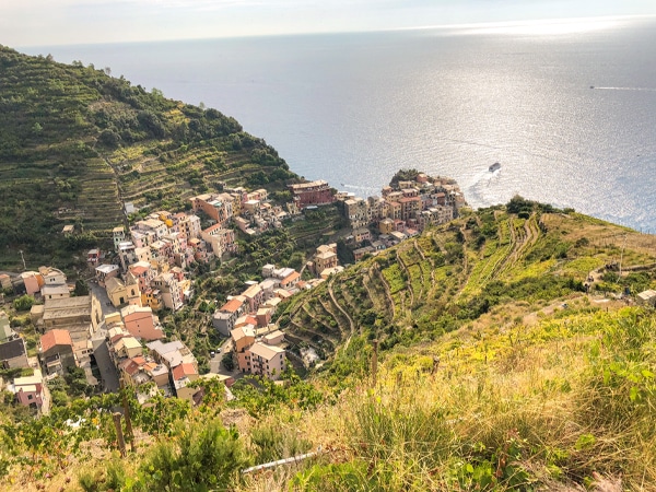 Beautiful view of the sea and village below on Cinque Terre trail in Liguria, Italy