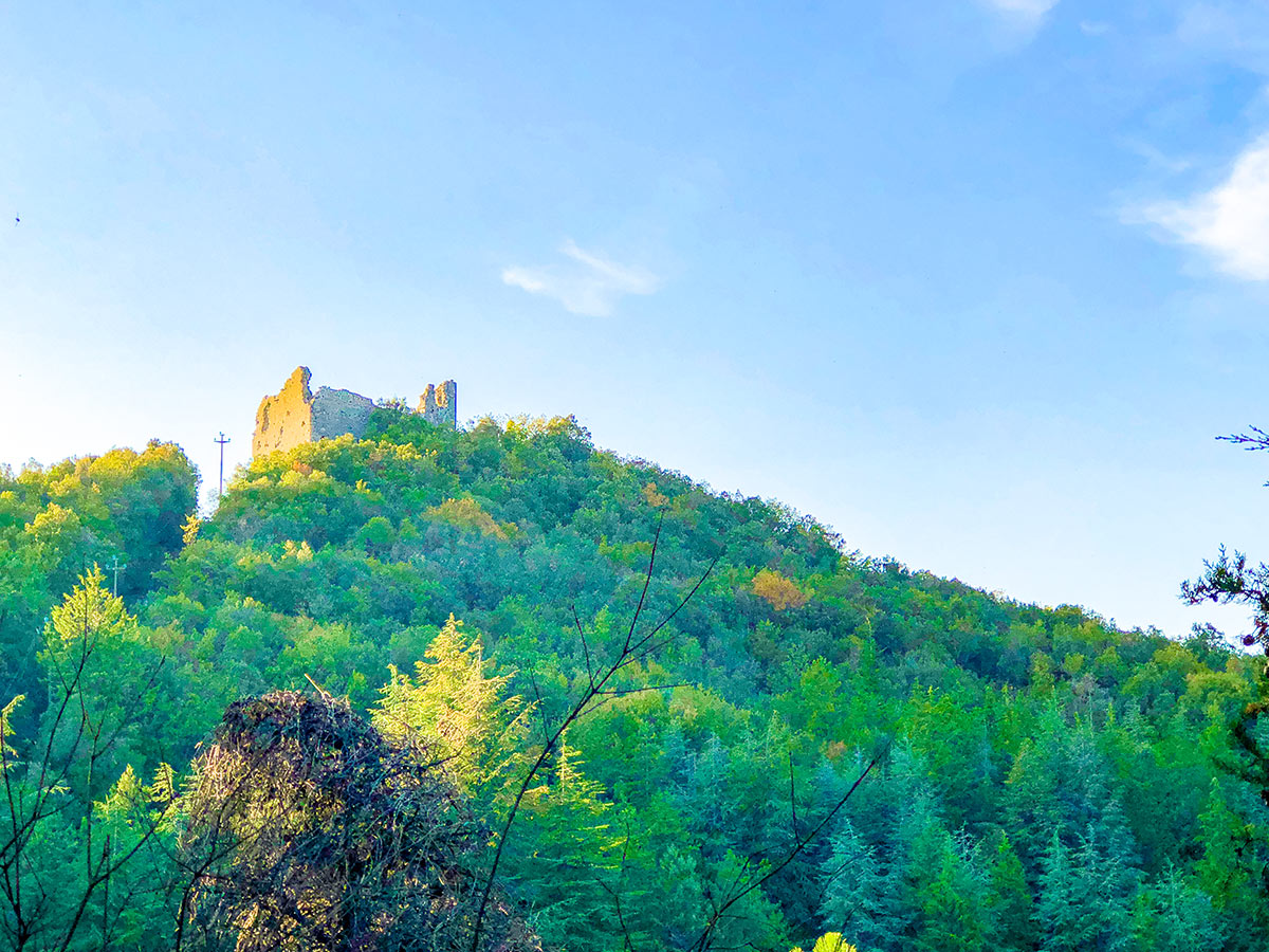 Ruins of hilltop fortress near Gaiole on Gaiole Loop Hike in Tuscany, Italy