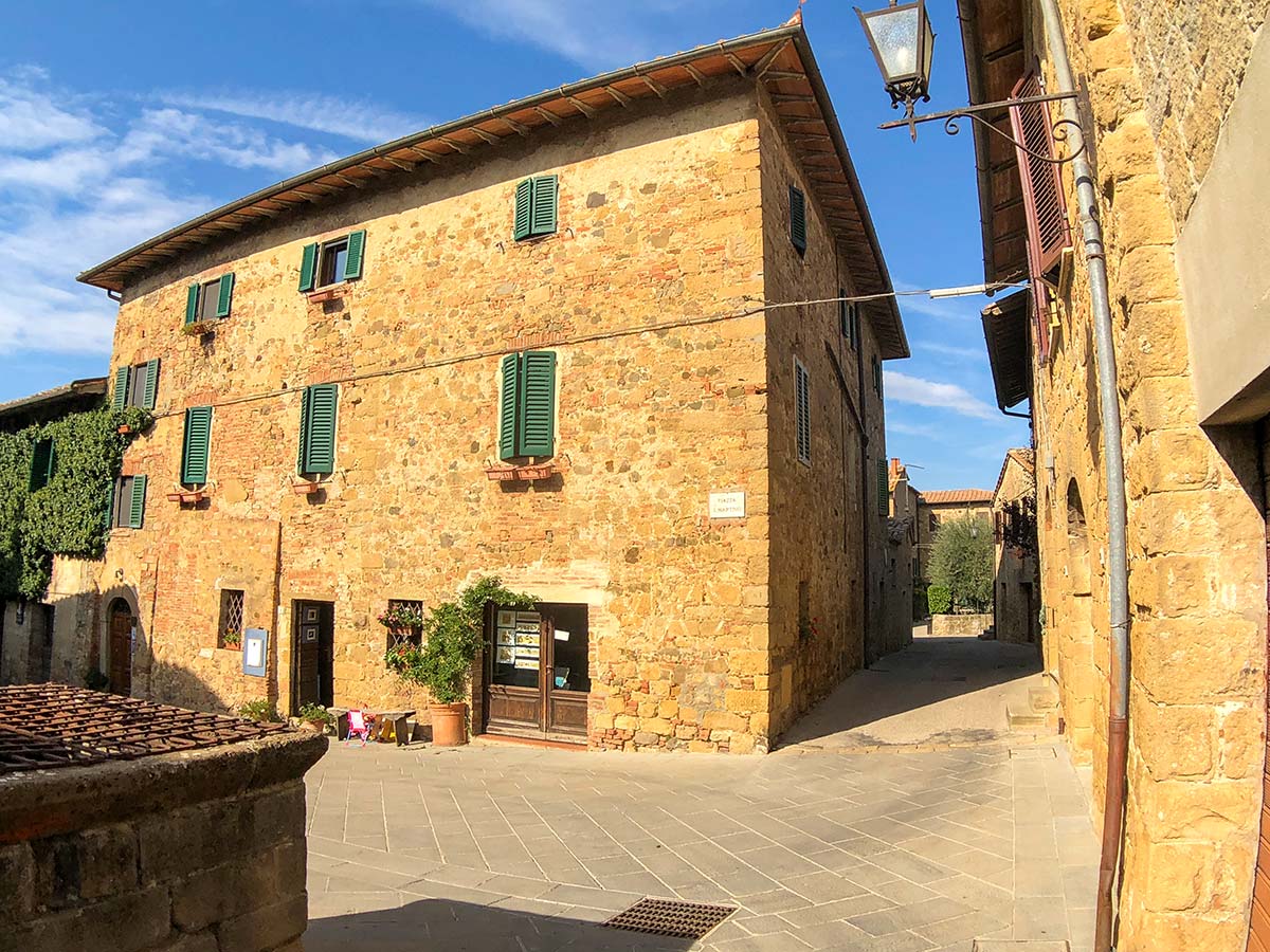 Small authentic Italian village of Montepulciano on Pienza to Montepulciano Hike in Tuscany