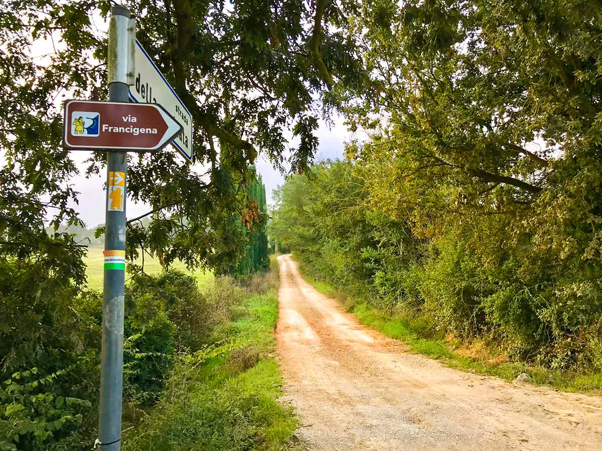 Signage on Monteriggioni to Piazza del Campo Siena Via Francigena Hike in Tuscany, Italy