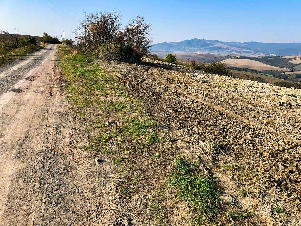 Dirt road path of Volterra Loop Hike in Tuscany, Italy