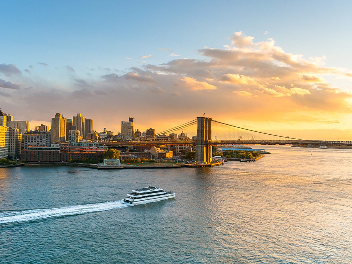 East River Ferry passing on Williamsburg Walking Tour in New York City