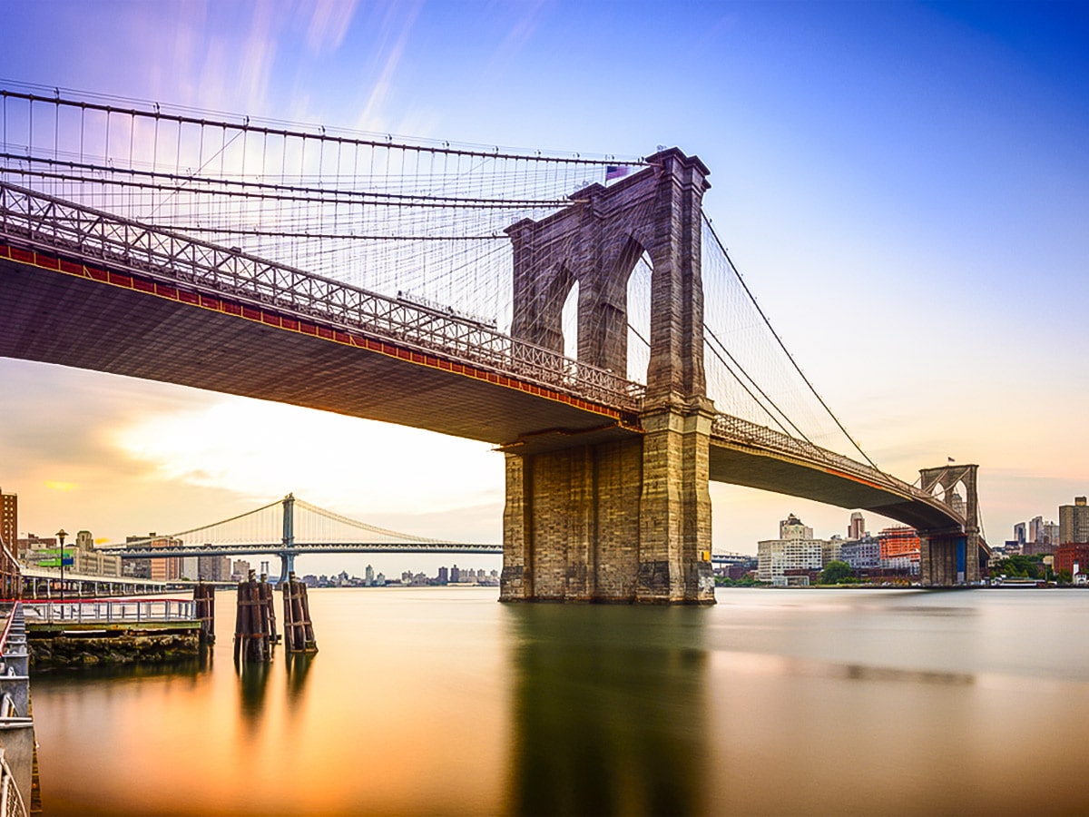 Brooklyn Bridge at Sunrise on Brooklyn Bridge, Wall Street, Statue of Liberty Walking Tour in New York City