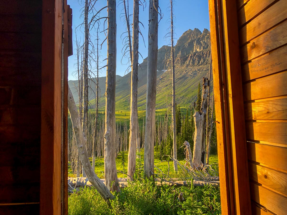 View from the prettiest outhouse on earth on North Circle Backpacking Trail in Glacier National Park