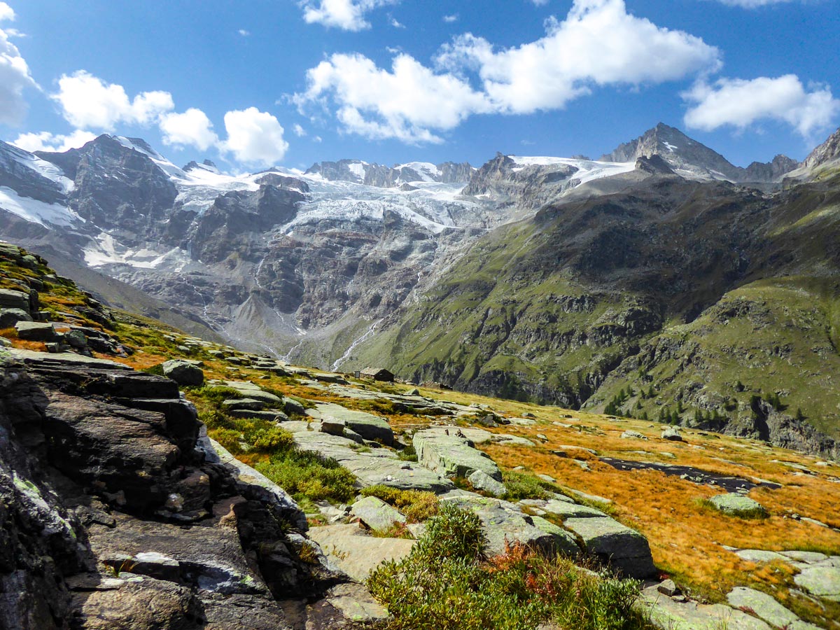Alpe Money under beautiful glaciers on Alpe Money hike in Gran Paradiso National Park, Italy