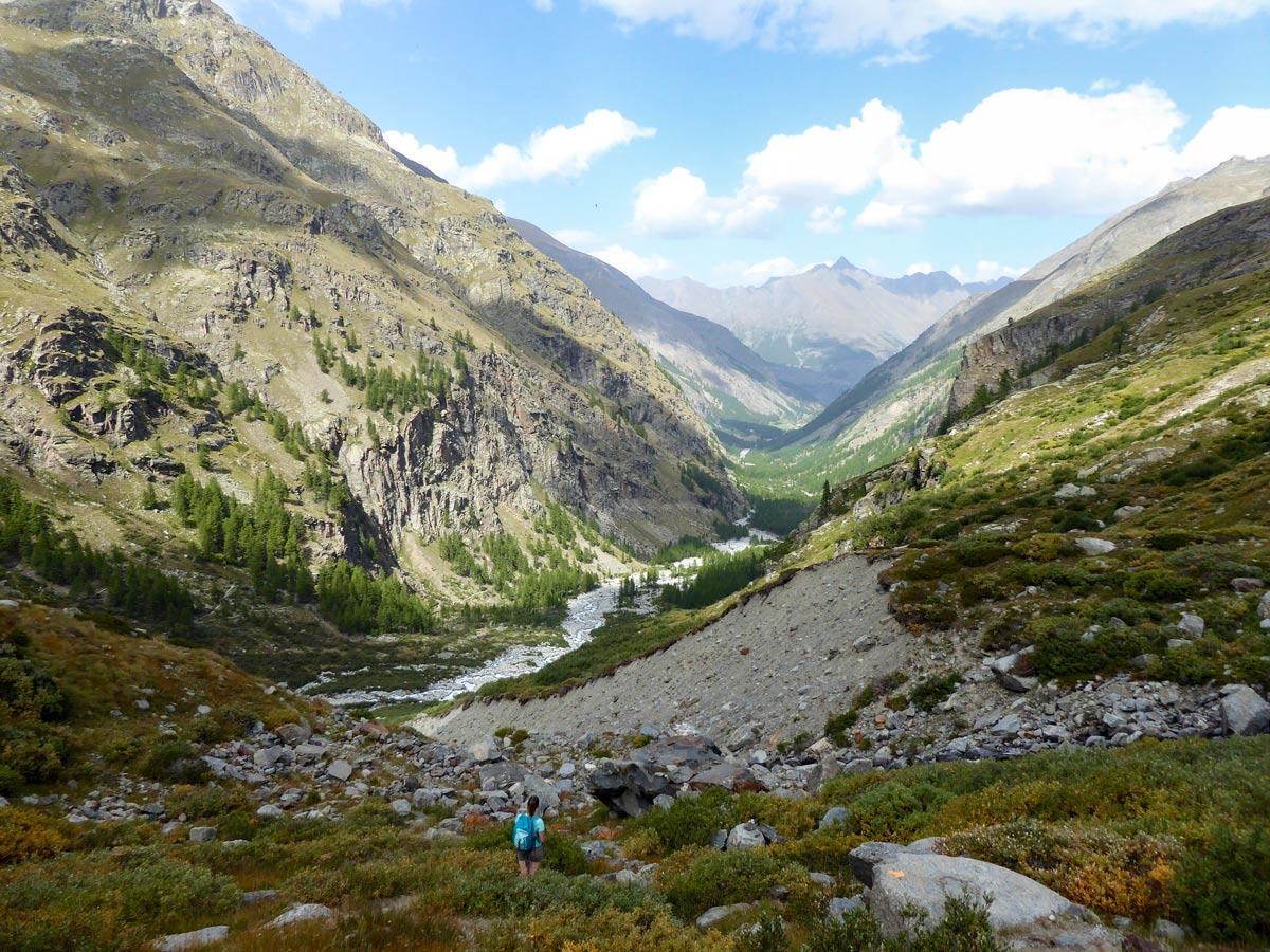 Looking at Valnontey Valley on Alpe Money hike in Gran Paradiso National Park, Italy