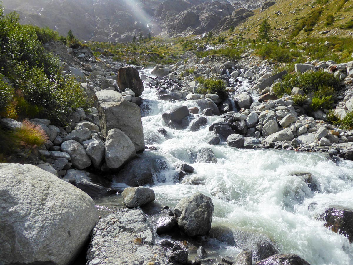 Noisy stream of Valnontey River on Alpe Money hike in Gran Paradiso National Park, Italy