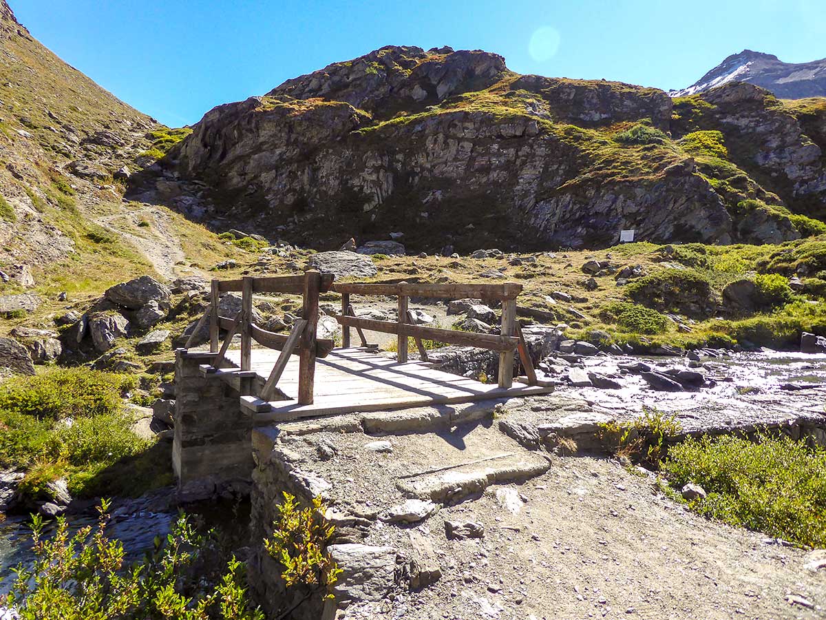 Bridge over Grauson River on Col de Saint-Marcel hike in Gran Paradiso National Park