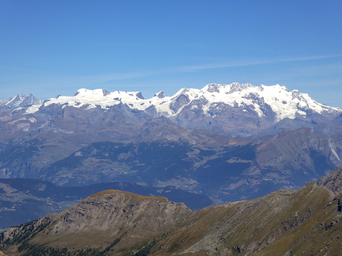 Mountain ridge on Italy and Switzerland border including Monte Rosa as seen from Col de Saint-Marcel hike in Gran Paradiso National Park
