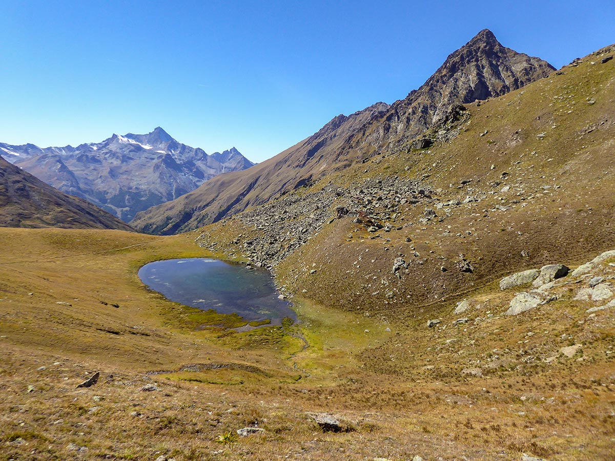 Nameless tarn on Col de Saint-Marcel hike in Gran Paradiso National Park, Italy