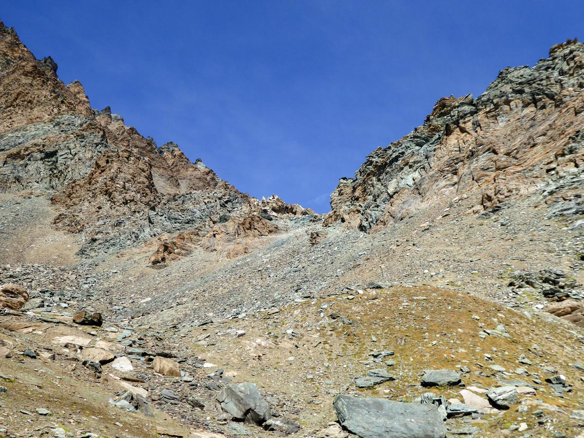 Colourful rocks on Colle della Rossa hike in Gran Paradiso National Park, Italy
