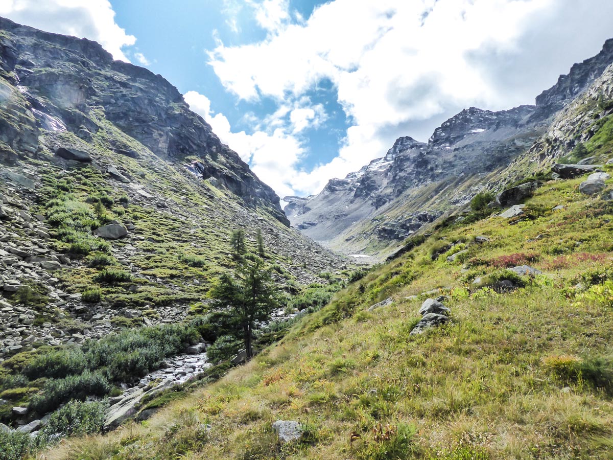 Glacier far away on Ghiacciaio Grand Étret hike in Gran Paradiso National Park, Italy