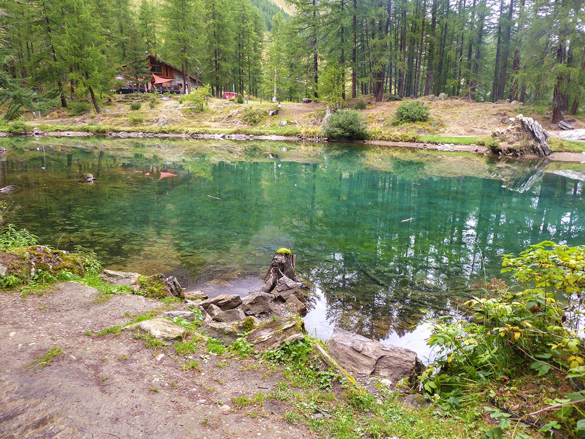 Crystal clear Lago Pellaud on Lago Pellaud via the Grand Rû Ring hike near Gran Paradiso National Park, Italy