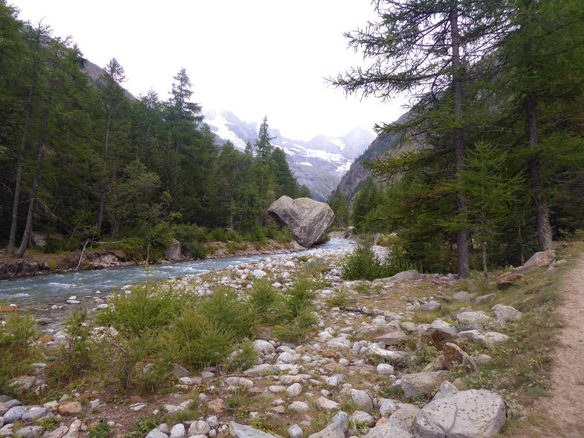 Big rock boulder in Valnontey River near Aosta Valley