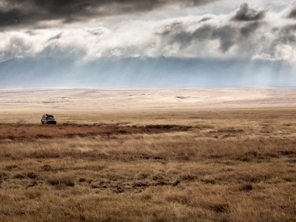 Views of a Ngorongoro Crater safari Jeep on this guided bike tour