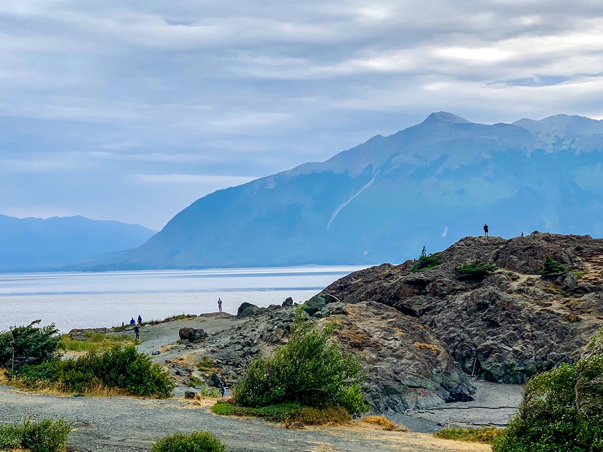 Tourists near Portage Lake near Byron Glacier Trail in Alaska