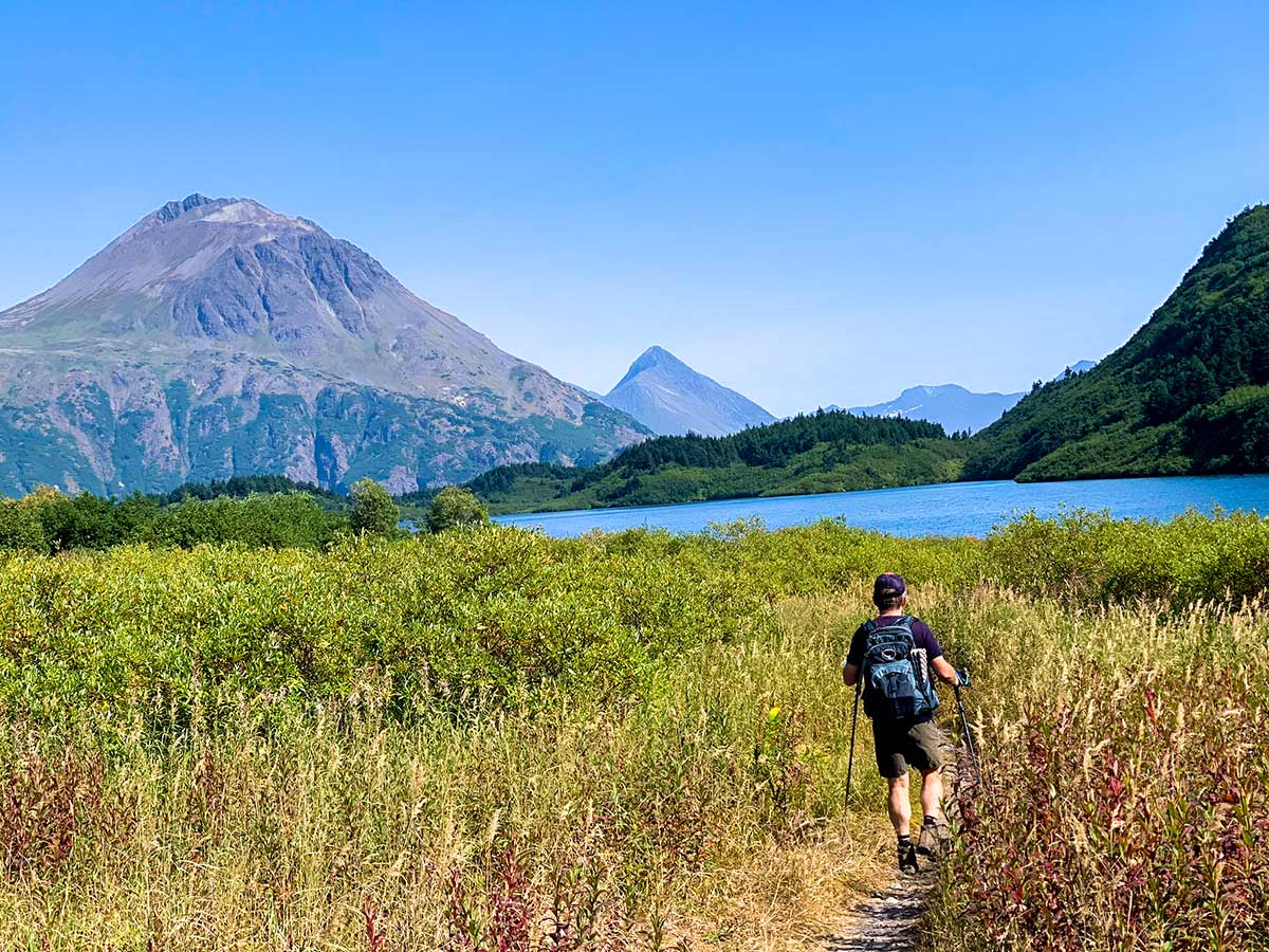 Hiker approaching the lake on Carter Lake Trail in Kenai Peninsula