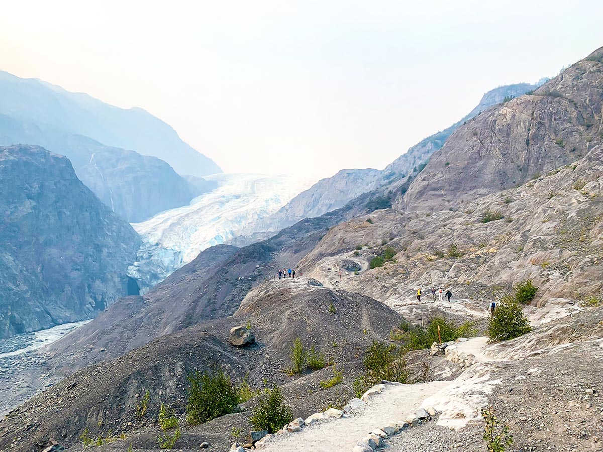 Tourists near overlook to Exit Glacier in Kenai Pennsula Alaska