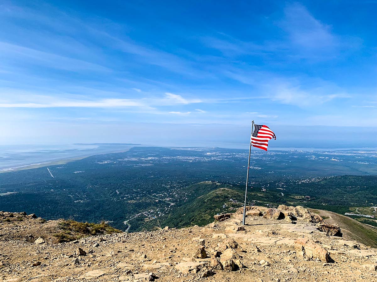 USA flag on top of the Flattop Mountain near Anchorage Alaska