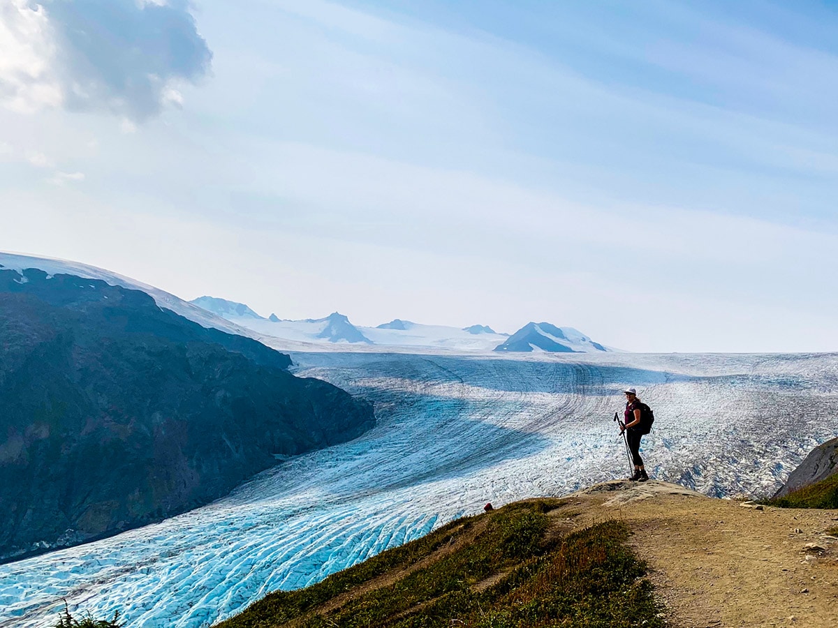 Hiker near overlook to the top of Exit Glacier on Harding Icefield Hike