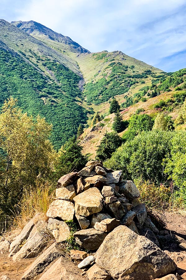 Cairn on a way to the top of Hope Point hike in Kenai Mountains