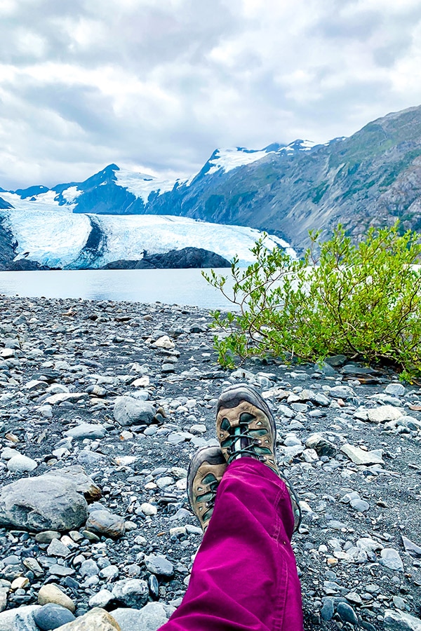 Resting in front of Portage Glacier on Portage Pass and Lake Trail Alaska