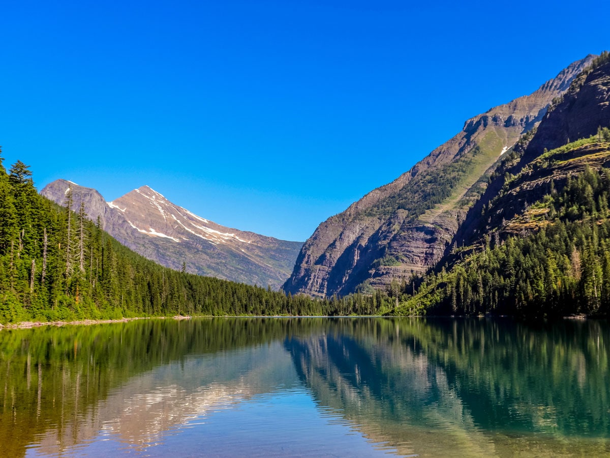 beautiful reflections of mountains Avalanche Lake