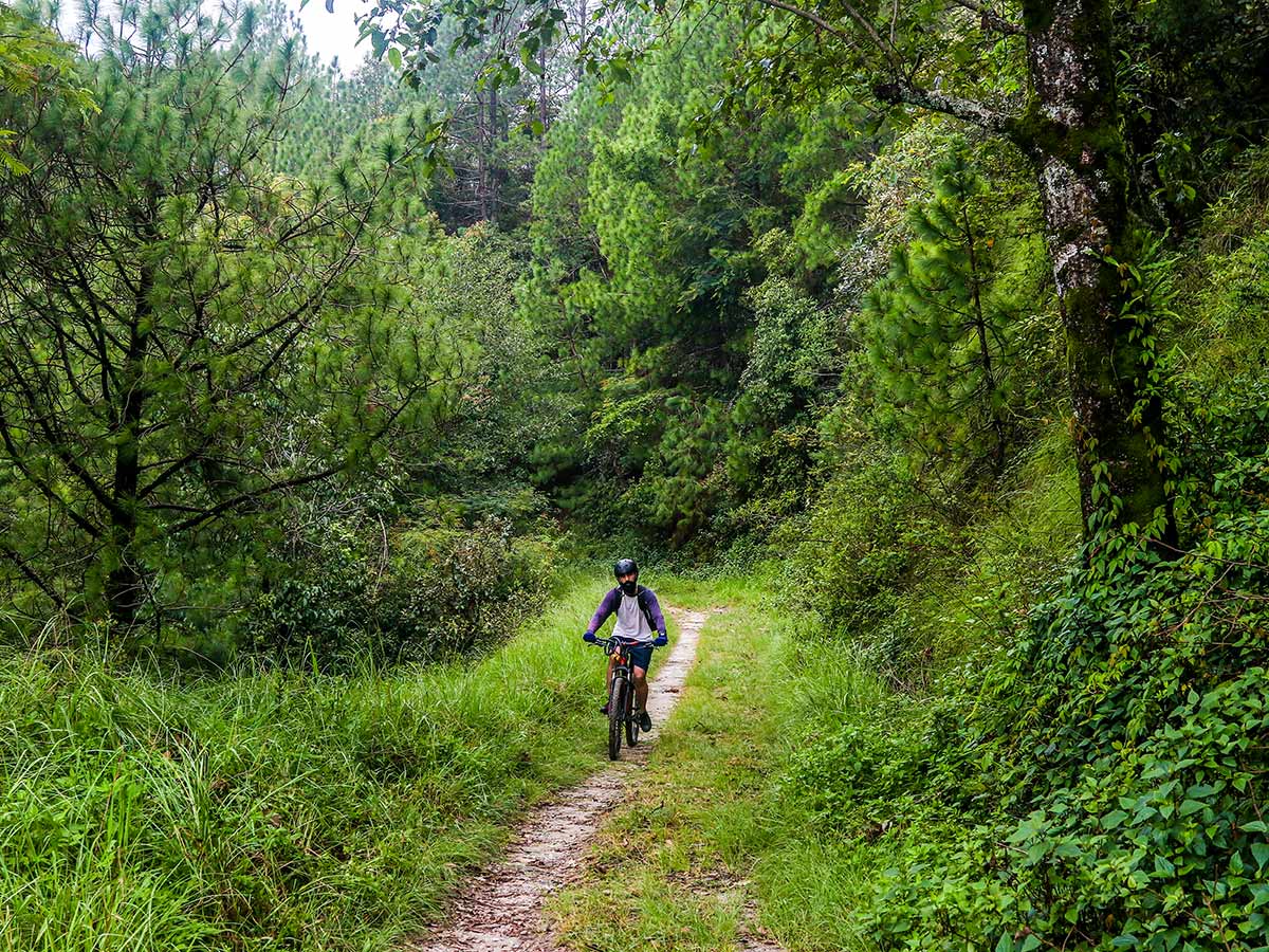 Riding a single track just after crossing Budhanilkantha