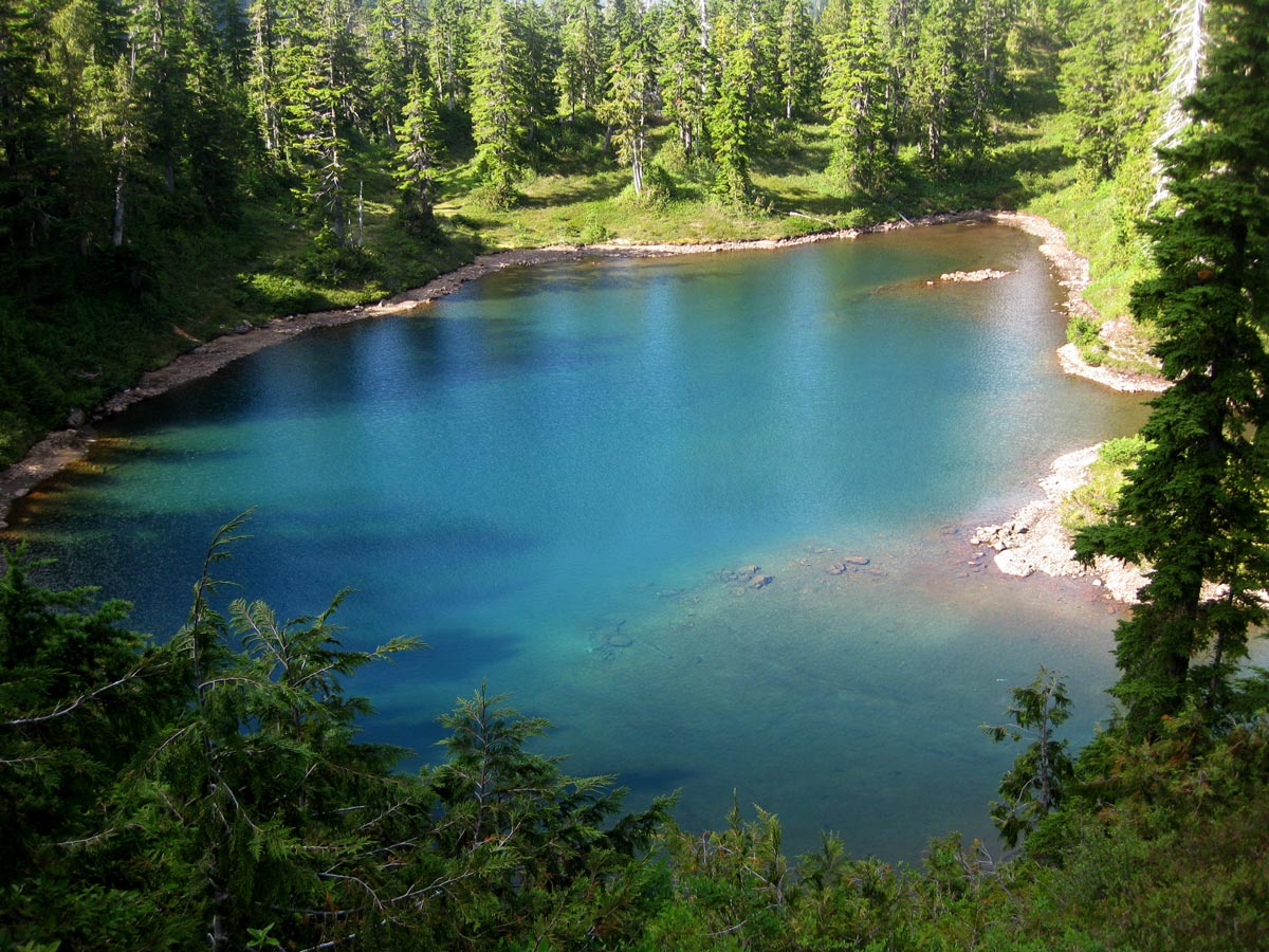 Beautiful turquoise lake along Howe Sound Crest Trail in North Shore region of British Columbia