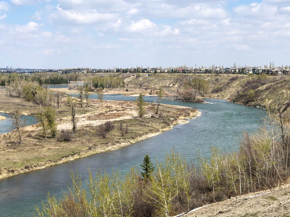 Beautiful winding river viewed from walking trails in Cranston Ridge area Calgary Alberta