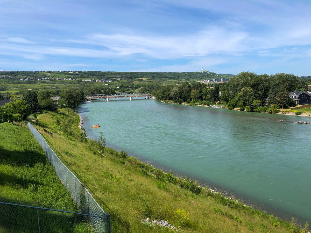 River floating along Bowmont Park walking path in Calgary Alberta