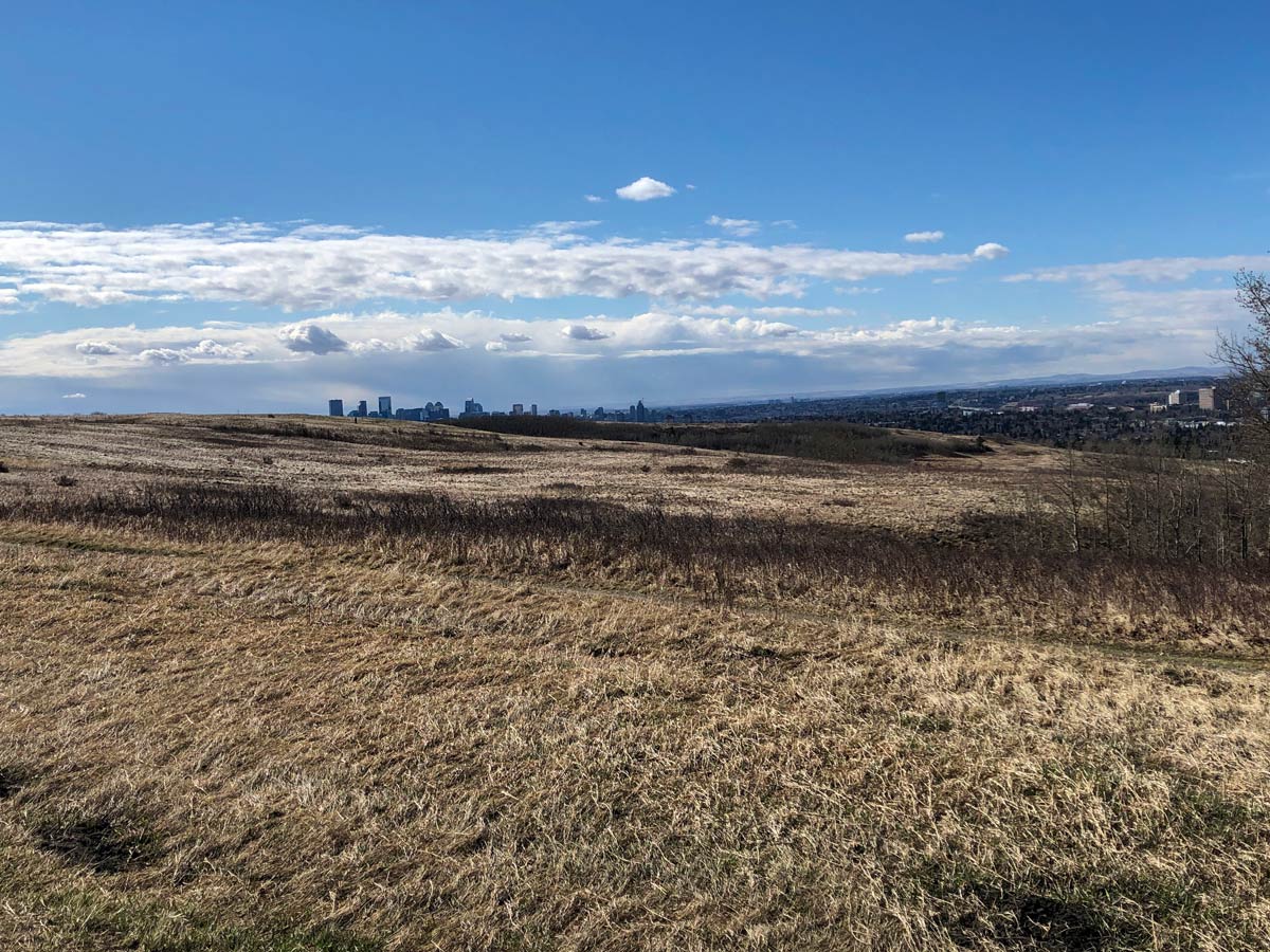 Nosehill park trails on the hills above Calgary Skyline in Calgary Alberta