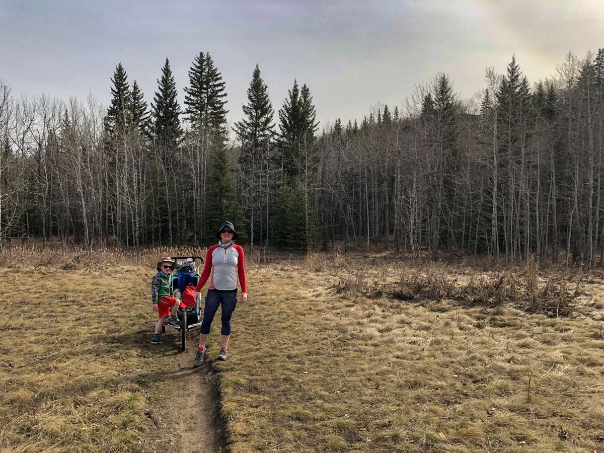 Children playing along beautiful West Fish Creek in Calgary Alberta