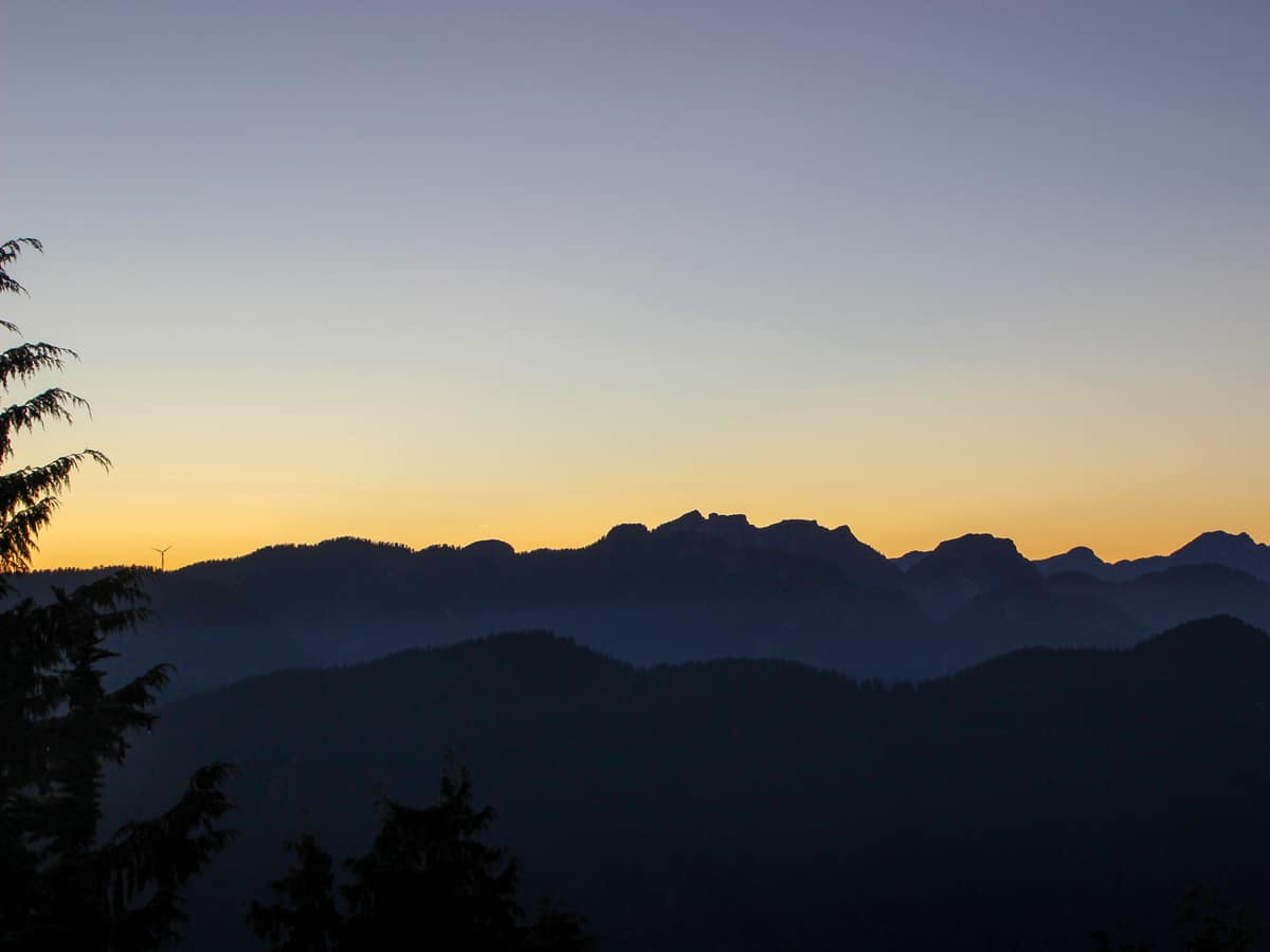 Sunset over British Columbias coastal mountains from Dog mountain on the North Shore